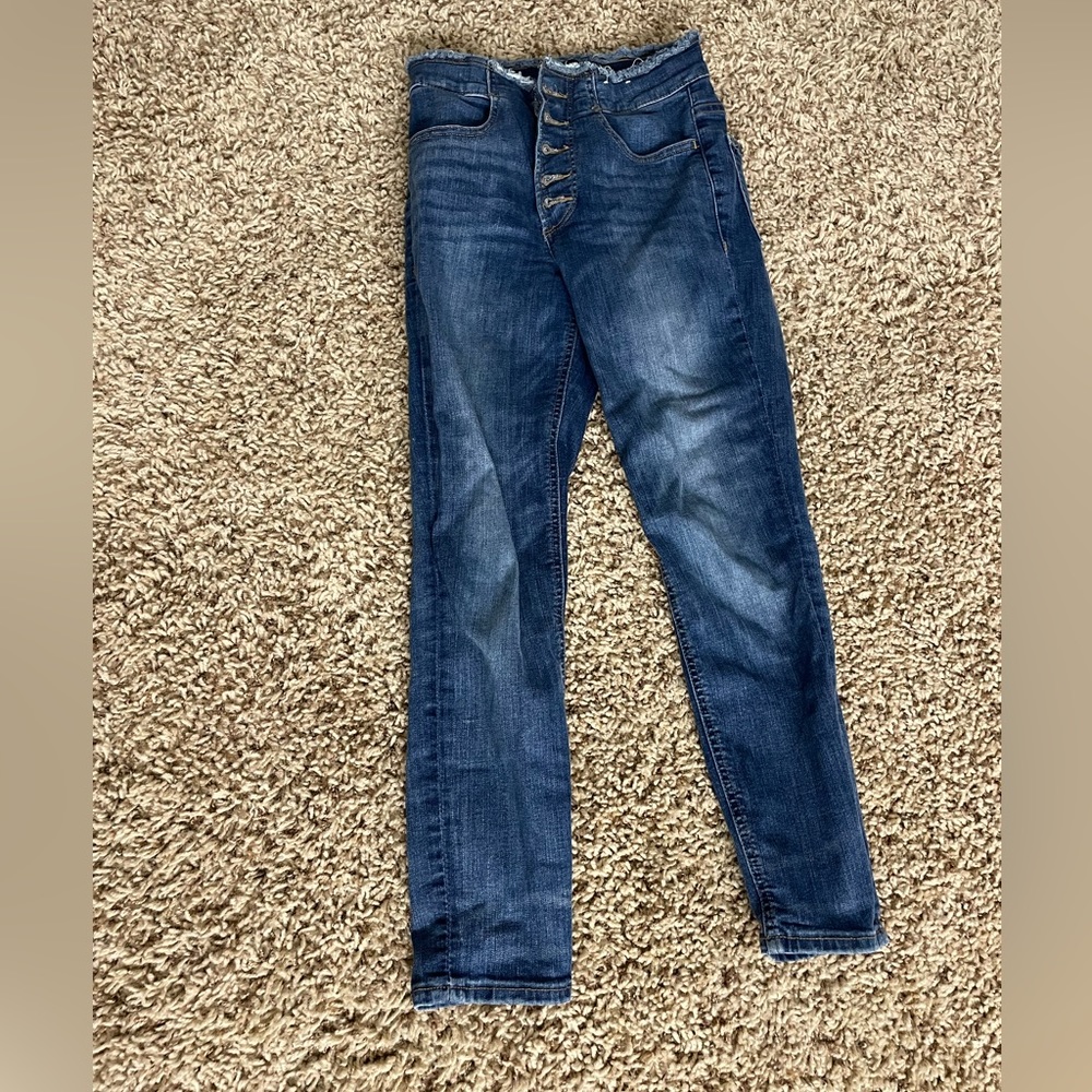 Button fly skinny jeans